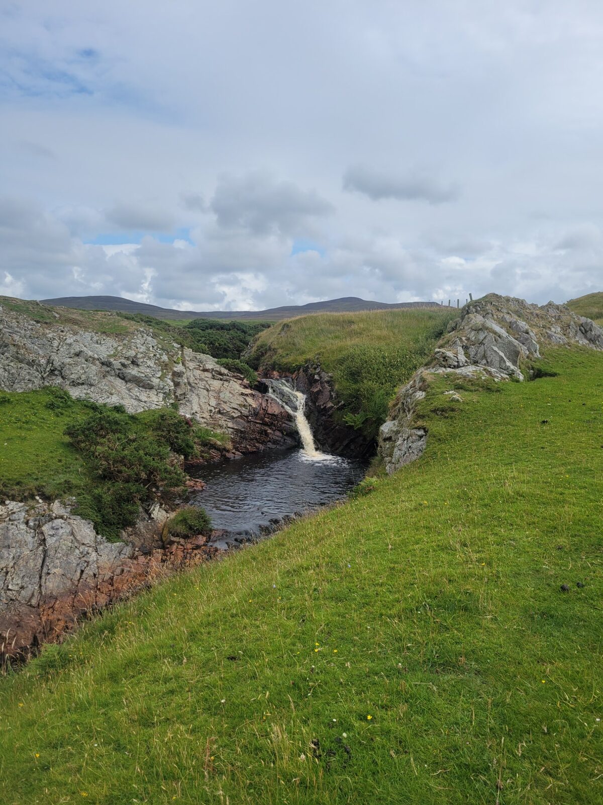 a waterfall in scotland